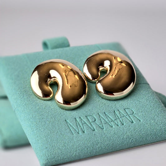 Experience elegant simplicity with our Rose Gold Bubble Stud Earrings. Crafted from hypoallergenic stainless steel, these earrings are water and sweat-resistant, ensuring long-lasting wear. With their tarnish-proof and low maintenance design, these sustainable earrings are the perfect addition to any collection.