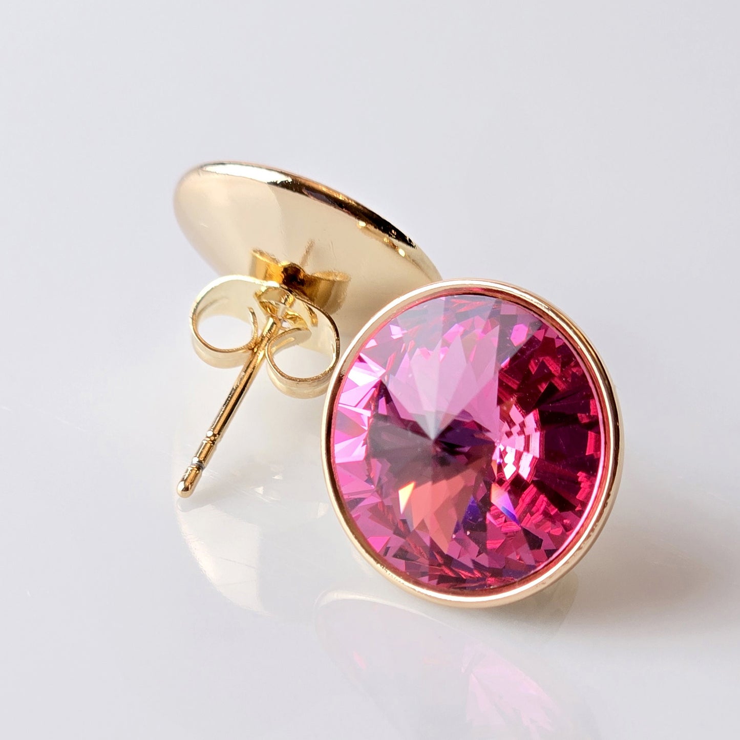 Crafted with high-quality stainless steel, these rose gold pink sparkle stud earrings are hypoallergenic, water-resistant, and sweat-resistant. With a tarnish-proof finish, they are low maintenance and sustainable. Perfect for any occasion.