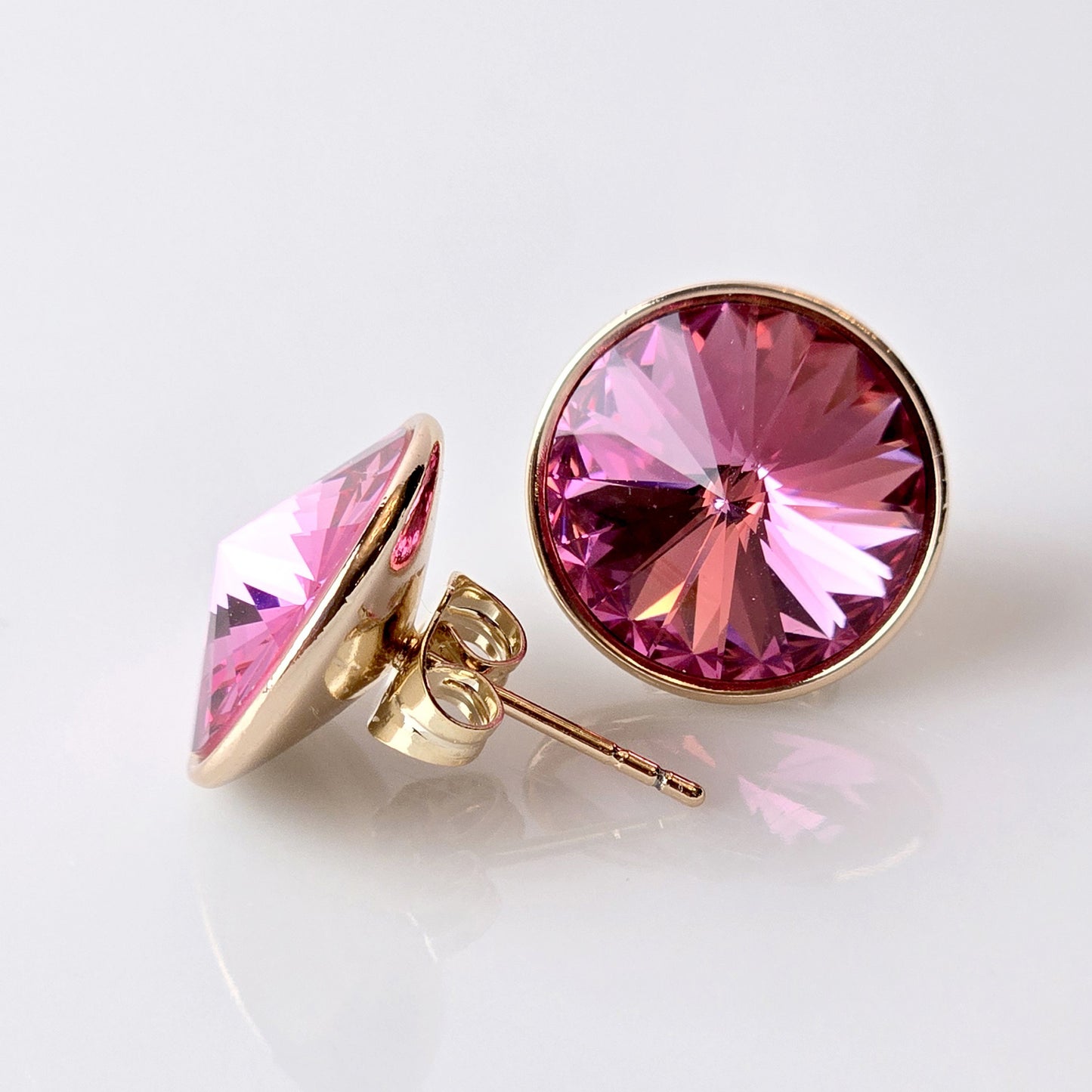 Crafted with high-quality stainless steel, these rose gold pink sparkle stud earrings are hypoallergenic, water-resistant, and sweat-resistant. With a tarnish-proof finish, they are low maintenance and sustainable. Perfect for any occasion.