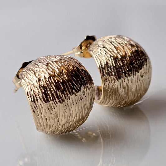Expertly crafted in the finest hypoallergenic stainless steel, these Rose Gold Rustic Bubble Hoop Earrings are not only stylish but also durable and sustainable. With water and sweat-resistant properties, they require minimal maintenance and offer long-lasting wear. Lightweight and tarnish-proof for a comfortable and chic look.