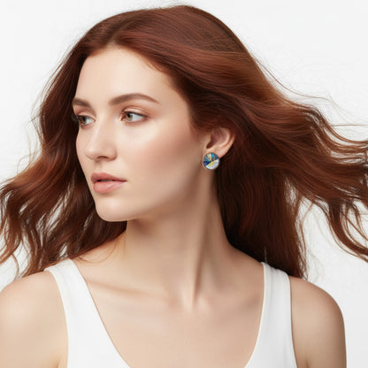Woman wearing earrings with a neutral background