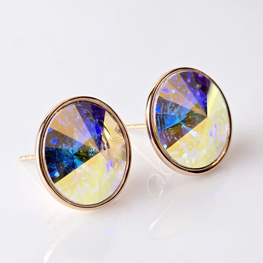 Expertly crafted using hypoallergenic, sustainable stainless steel, these Rose Gold Yellow Sparkle Stud Earrings offer superior quality. With water and sweat-resistant properties, these lightweight earrings are low maintenance and tarnish-proof. Perfect for all-day wear without irritation.