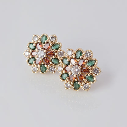 Each earring in this set of Small Rose Gold Green Red Flower Stud Earrings is made with hypoallergenic, high-quality stainless steel that is tarnish-proof and sustainable. Enjoy the benefit of low maintenance and lightweight earrings that will add a touch of color and elegance to any outfit.