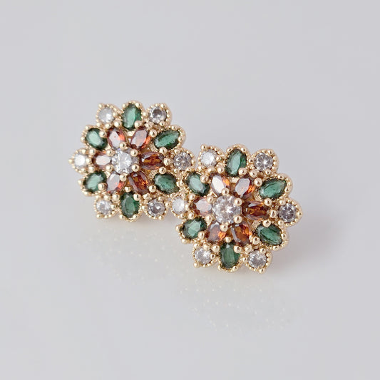 Each earring in this set of Small Rose Gold Green Red Flower Stud Earrings is made with hypoallergenic, high-quality stainless steel that is tarnish-proof and sustainable. Enjoy the benefit of low maintenance and lightweight earrings that will add a touch of color and elegance to any outfit.