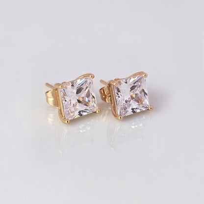 
Upgrade your jewelry collection with our Small Rose Gold Princess Cut Stud Earrings. Crafted from hypoallergenic, tarnish-proof stainless steel, these earrings are both sustainable and low maintenance. Enjoy the lightweight design and timeless beauty of this high-quality piece.