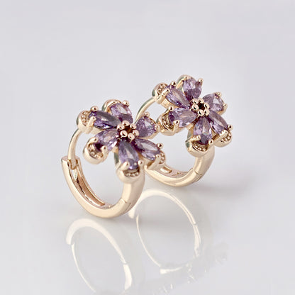 Crafted with the highest quality hypoallergenic stainless steel, these Small Rose Gold Purple Flower Huggie Earrings are both sustainable and lightweight. With a tarnish-proof design and low maintenance requirements, these earrings are a durable and stylish addition to any accessory collection.