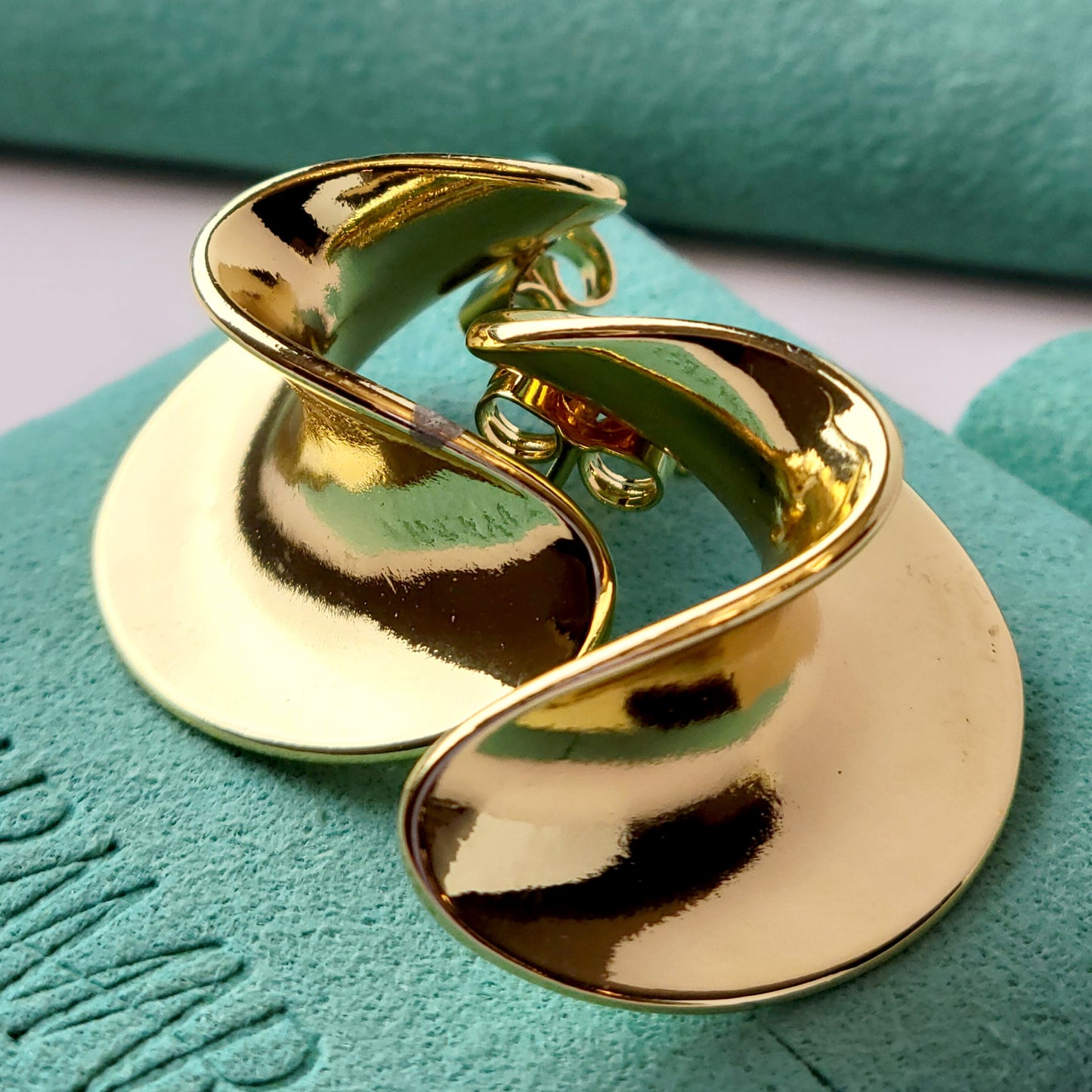 Crafted from the finest hypoallergenic stainless steel, our Weavy Gold Stud Earrings are perfect for those with sensitive ears. These earrings are also tarnish-proof, sustainable, and require minimal upkeep. Enjoy a lightweight and stylish option for any occasion.